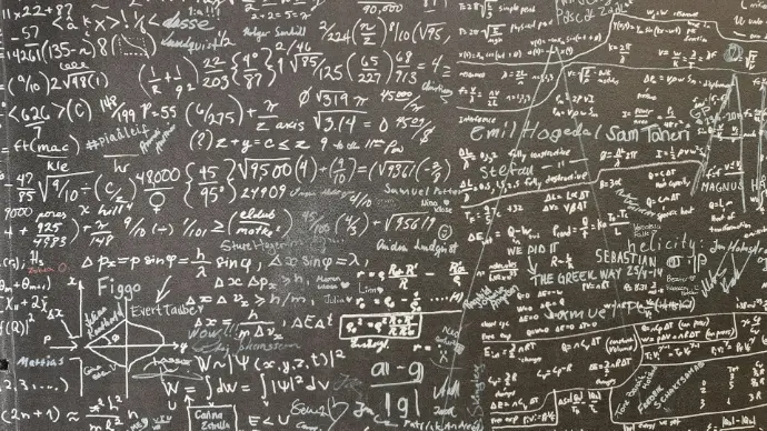 a blackboard with a lot of writing on it